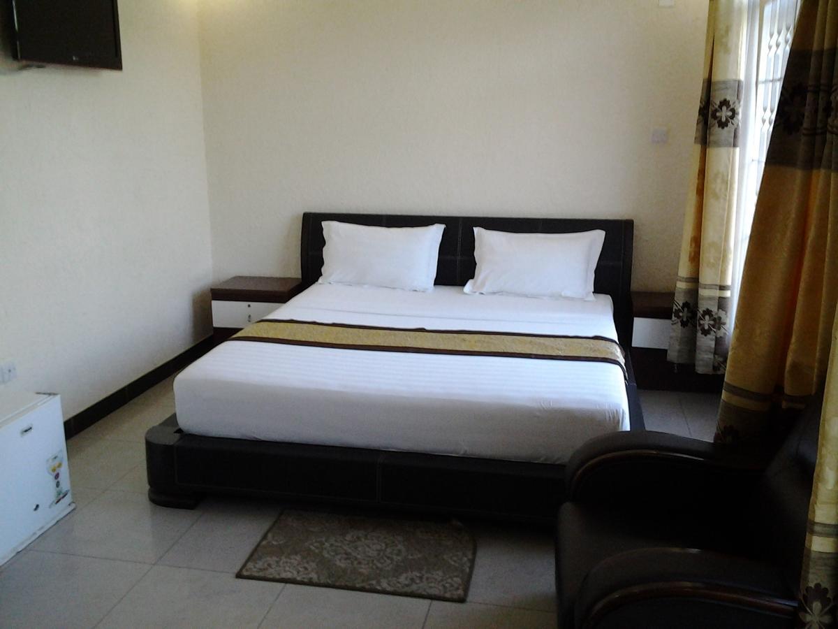 Best Point Hotel Дар-эс-Саламе Номер фото