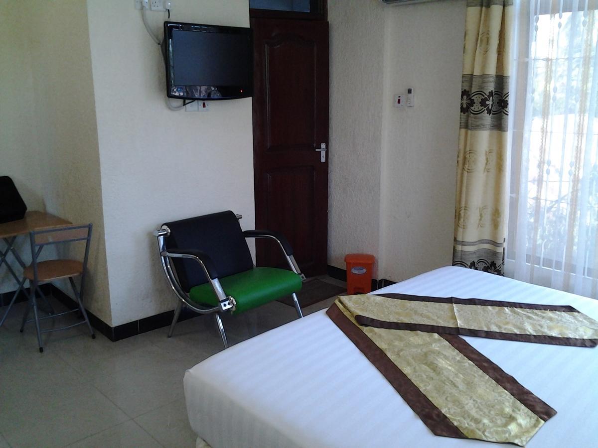 Best Point Hotel Дар-эс-Саламе Номер фото